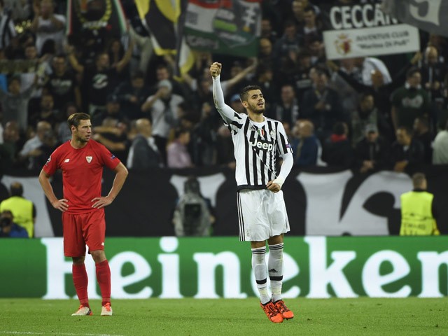 Juventus' forward from Spain Alvaro Morata celebrates after scoring during the UEFA Champions League football match Juventus vs FC Sevilla on September 30, 2015