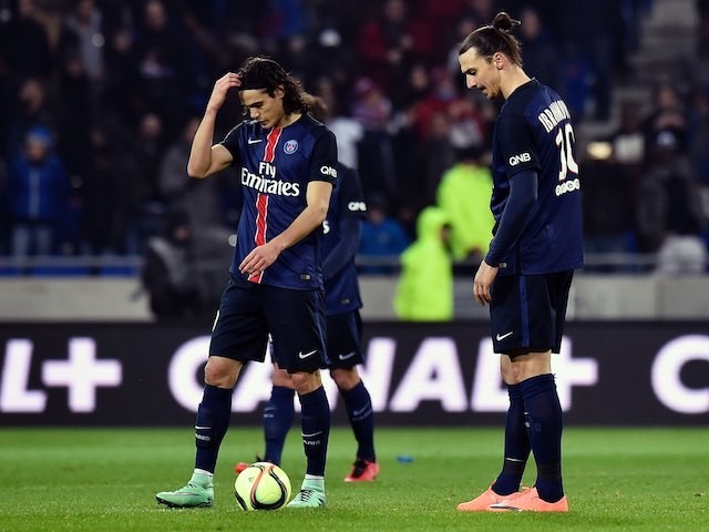 Zlatan Ibrahimovic and Edinson Cavani look downbeat during the Ligue 1 game between Lyon and Paris Saint-Germain on February 28, 2016